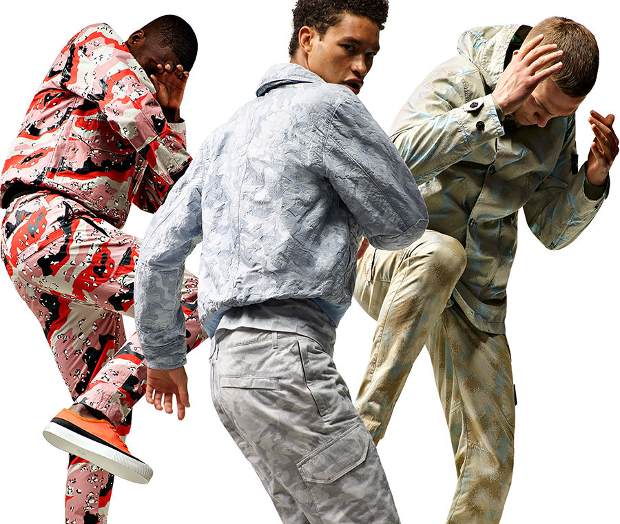 Five shots of the same model, wearing different styles of sweatshirts, pants, jackets, hats and a t shirt, all in the same pink, red and gray camouflage print.