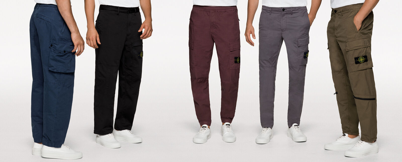 Close up shots of five models wearing white tops, white sneakers and different styles cargo pants in blue, black, burgundy, gray and military green.